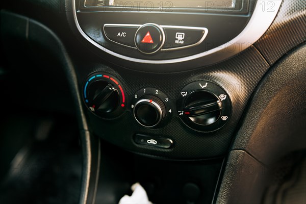 Front view of a car air conditioning control panel. Close up of automotive air conditioning switch panel