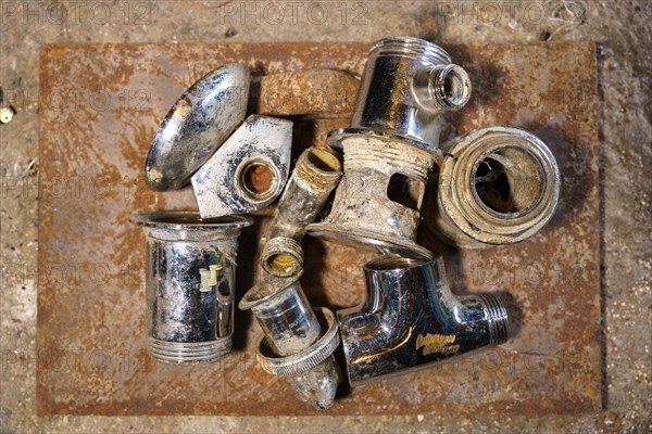 Old brass nuts and fittings for plumbing use recycling. Recycling of non-ferrous scrap