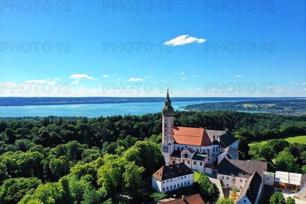 Aerial view of Andechs Monastery with the Lake Ammer lake in the background. Andechs