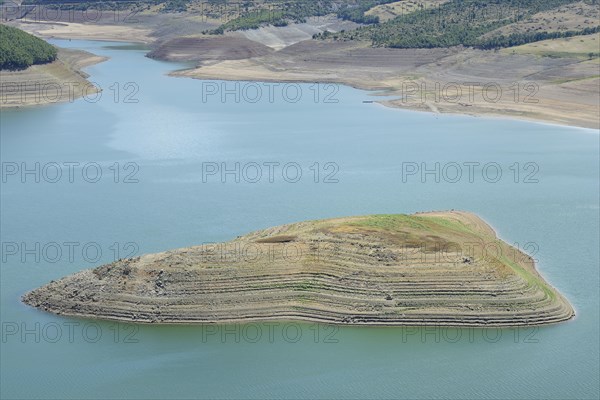 Little water in the Fierza reservoir with dry shore