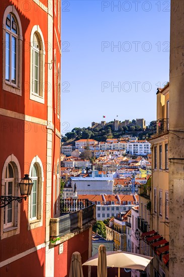 View over the old town of Lisbon to the castle Castelo de Sao Jorge