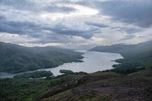 View over Loch Katrine from Ben Aan under cloudy skies