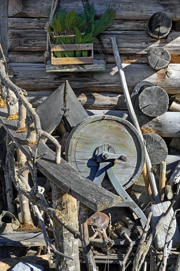 Detail of a Tyrolean alpine hut with old butter churn near Kempten