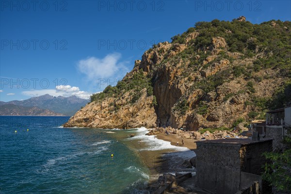 Beach and red rocks