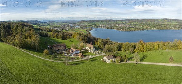 View from the Thurgau lake ridge slope to the farm settlement of Klingenzell with the Marian pilgrimage chapel of Our Lady of Sorrows