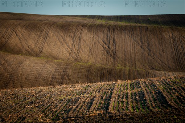 Beautiful harsh landscape of plowed Moravian fields in the autumn season. Czech republic
