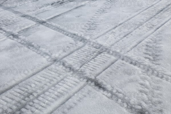 Vehicle tracks on frozen river