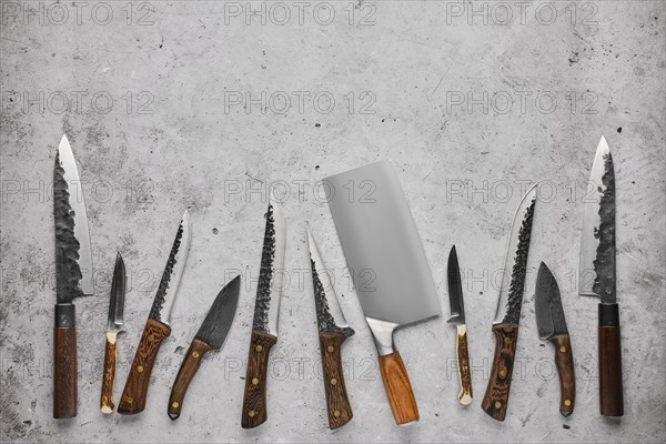 Different kinds of butchers knives forged by blacksmith