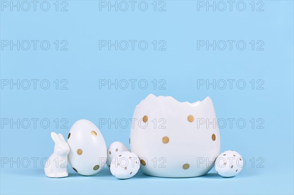 White easter eggs with golden dots