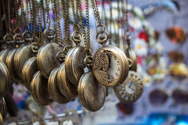 Set of retro styled pocket watches hanging