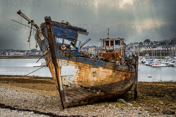 Old fishing boat in the ship graveyard of Camaret-sur-Mer