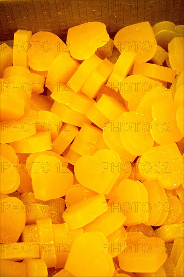 Colorful fragrant bars of soap in the shape of heart and