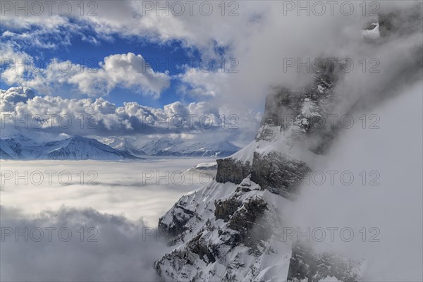 Fog with storm clouds over the Rhone valley