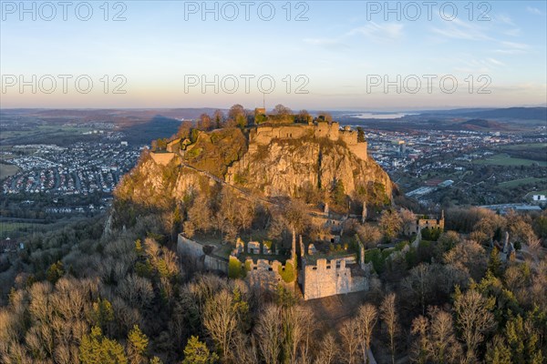 The volcanic cone Hohentwiel with the castle ruins illuminated by the evening sun