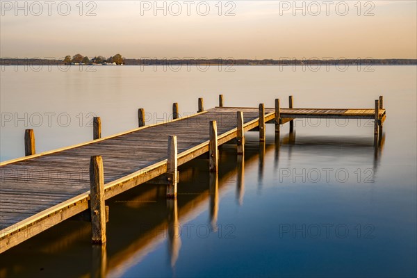 Jetty at sunrise in the Steinhuder Meer with Wilhelmstein Island