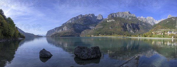 Mountains of the Brenta Group reflected in Lake Molveno