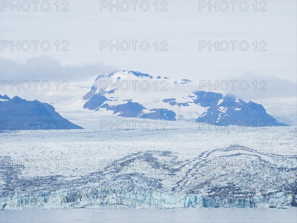 Glacier calving into Joekulsarlon Glacier Lagoon