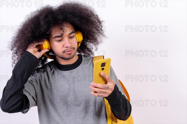 Young man with afro hair on white background