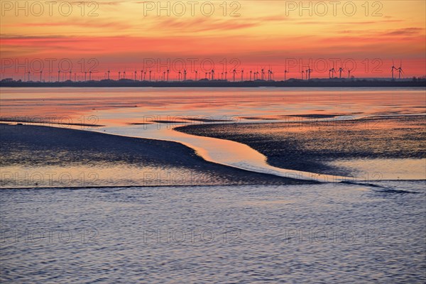 View over the Wadden Sea at low tide to the mainland