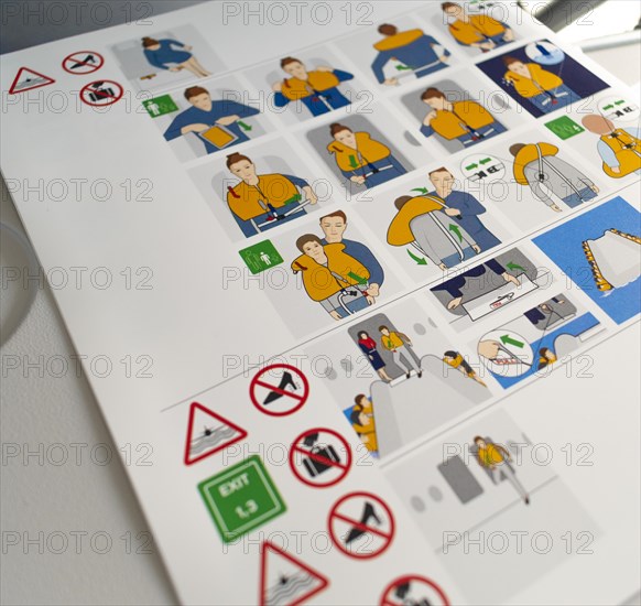 Boarding card with safety instructions in a Lufthansa A320 aircraft