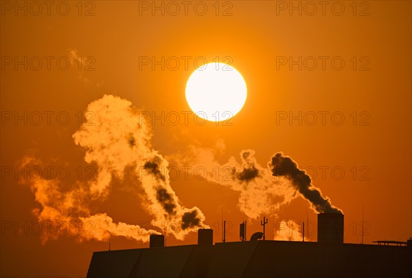 Smoke coming out of chimneys