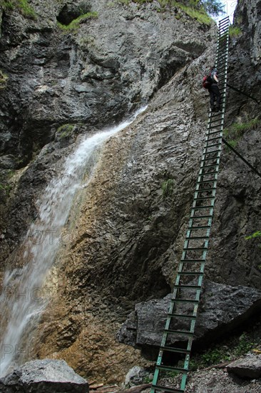 A tourist in the beautiful gorges of the Slovak Paradise National Park. Slovakia