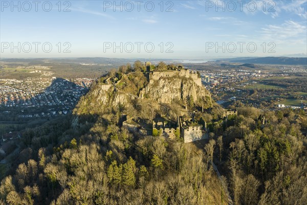 The volcanic cone Hohentwiel with the castle ruins illuminated by the evening sun