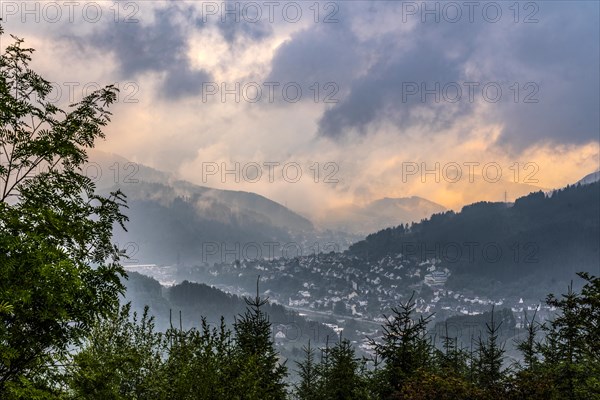 Sunrise and morning fog over Kirchhundem in Sauerland