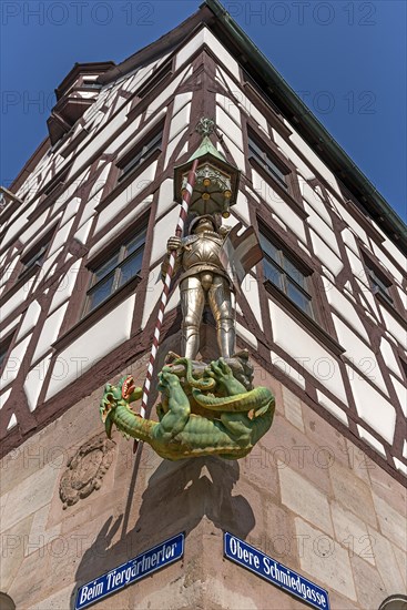 Figure of St. George as dragon slayer on Pilatus House