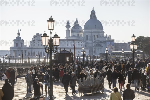 Tourists in front of the backdrop of the Basilica di Santa Maria della Salute