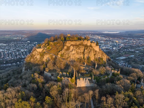 The volcanic cone Hohentwiel with the castle ruins illuminated by the evening sun