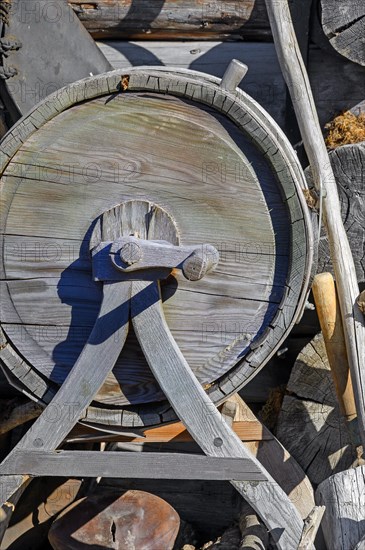 Detail of a Tyrolean alpine hut with old butter churn near Kempten