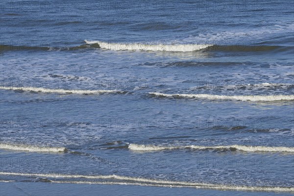 Leaking waves on a sandy beach