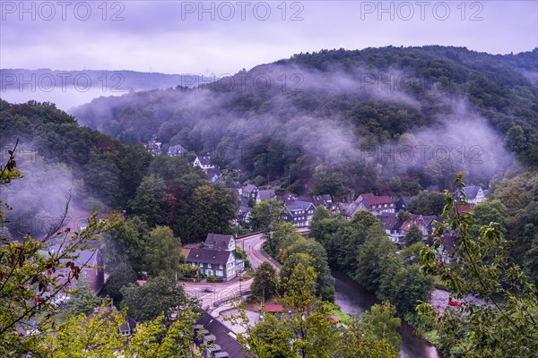 View of the village of Burg with the river Wupper in morning fog