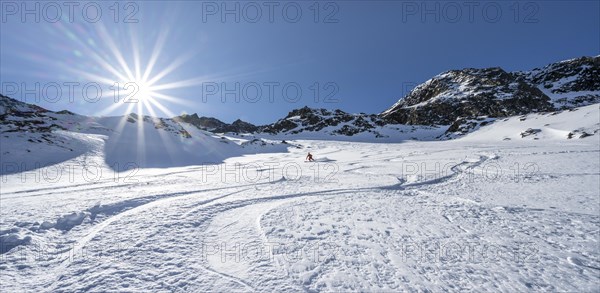 Skiers skiing downhill in Stamser Karle