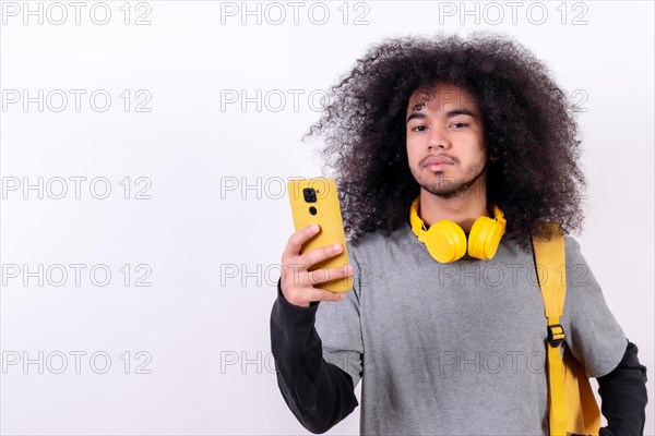 Young man with afro hair on white background