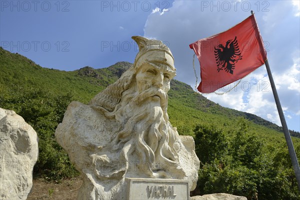 Skanderbeg monument with waving flag with double-headed eagle