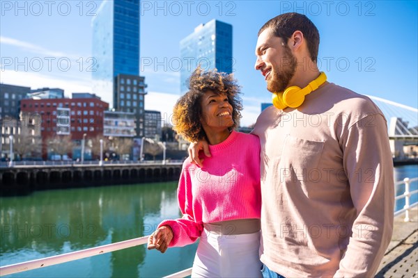 Multiracial friends through the streets of the city