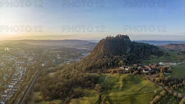 The volcanic cone with the Hohentwiel castle ruins illuminated by the morning sun