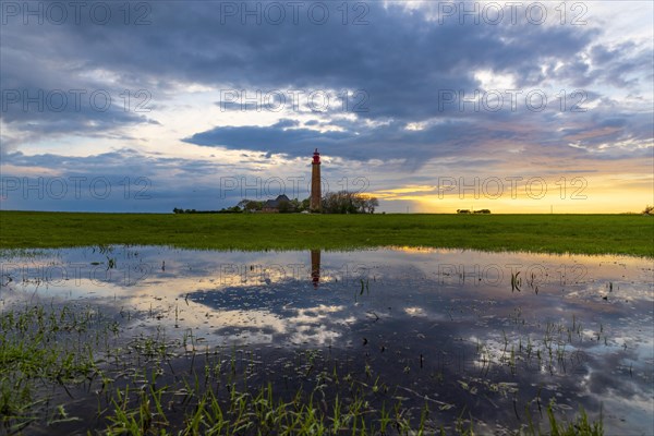 Sunset reflection at Fluegge lighthouse