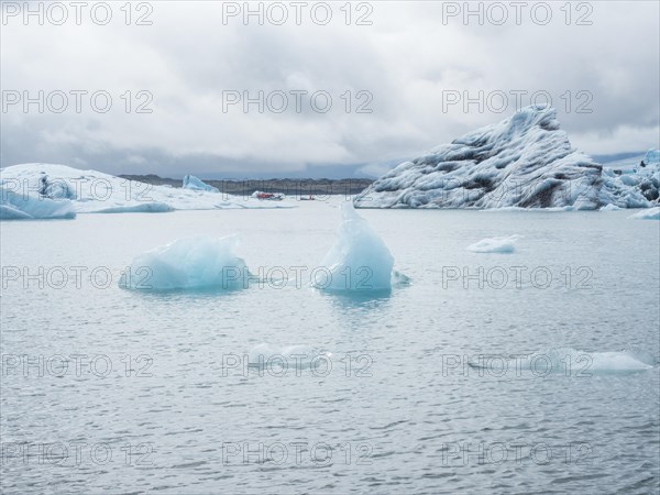 Chunks of ice floating in the Joekulsarlon glacier lagoon