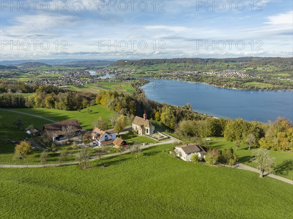 View from the Thurgau lake ridge slope to the farm settlement of Klingenzell with the Marian pilgrimage chapel of Our Lady of Sorrows