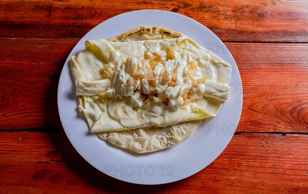 Top View of traditional Cheese with Pickled Onion