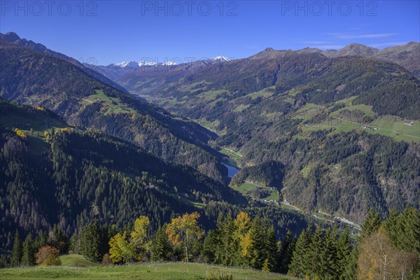 Snow-covered mountains above the Ulten Valley behind Zufrittspitze Tuferspitze and Hasenoehrl seen from the Pfrollnhof wine tavern