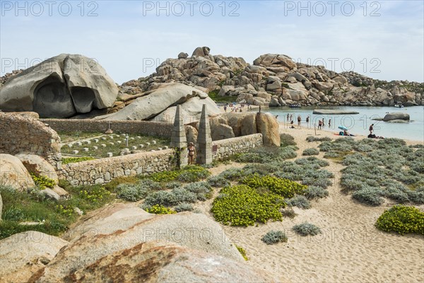 Granite rocks and cemetery on the beach