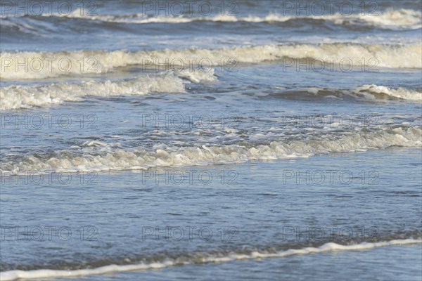 Leaking waves on a sandy beach