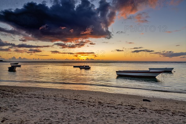 Sunset on the beach of Albion. Albion beach is amongst the most picturesque beaches in Mauritius. Located on the west coast of it is also home to the iconic Lighthouse of Albion