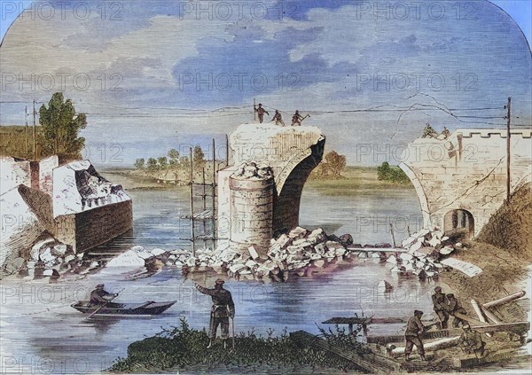 The blown up railway bridge near Trilport outside Meaux on the Marne river