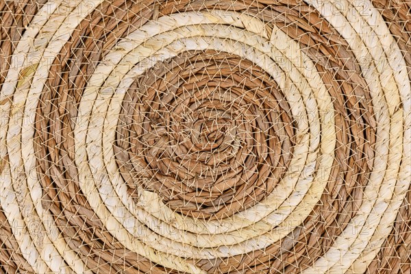 Round weave wicker basket pattern background