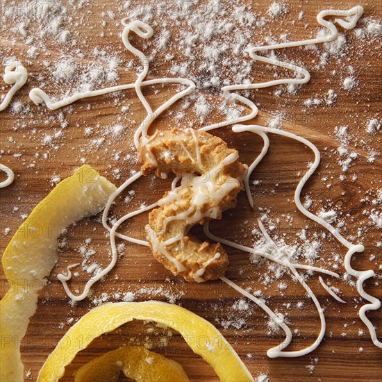 Spritz biscuits with icing on wood